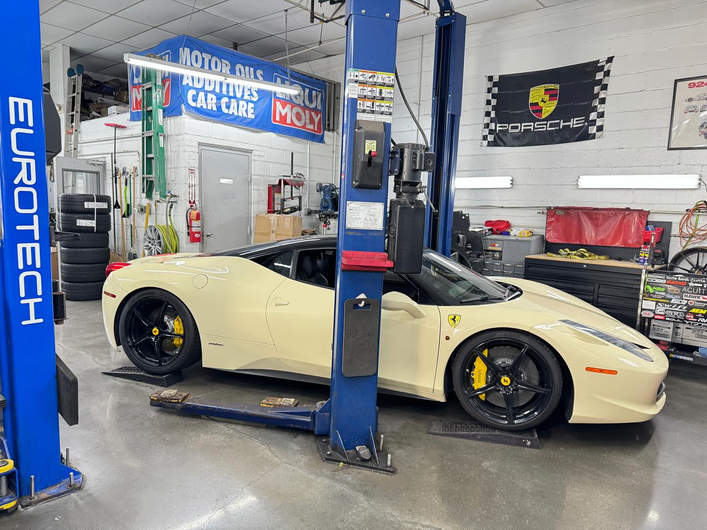 Ferrari 458 on the lift at Eurotech Motorsports